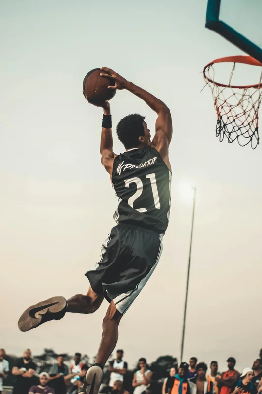 Basketball player dunking